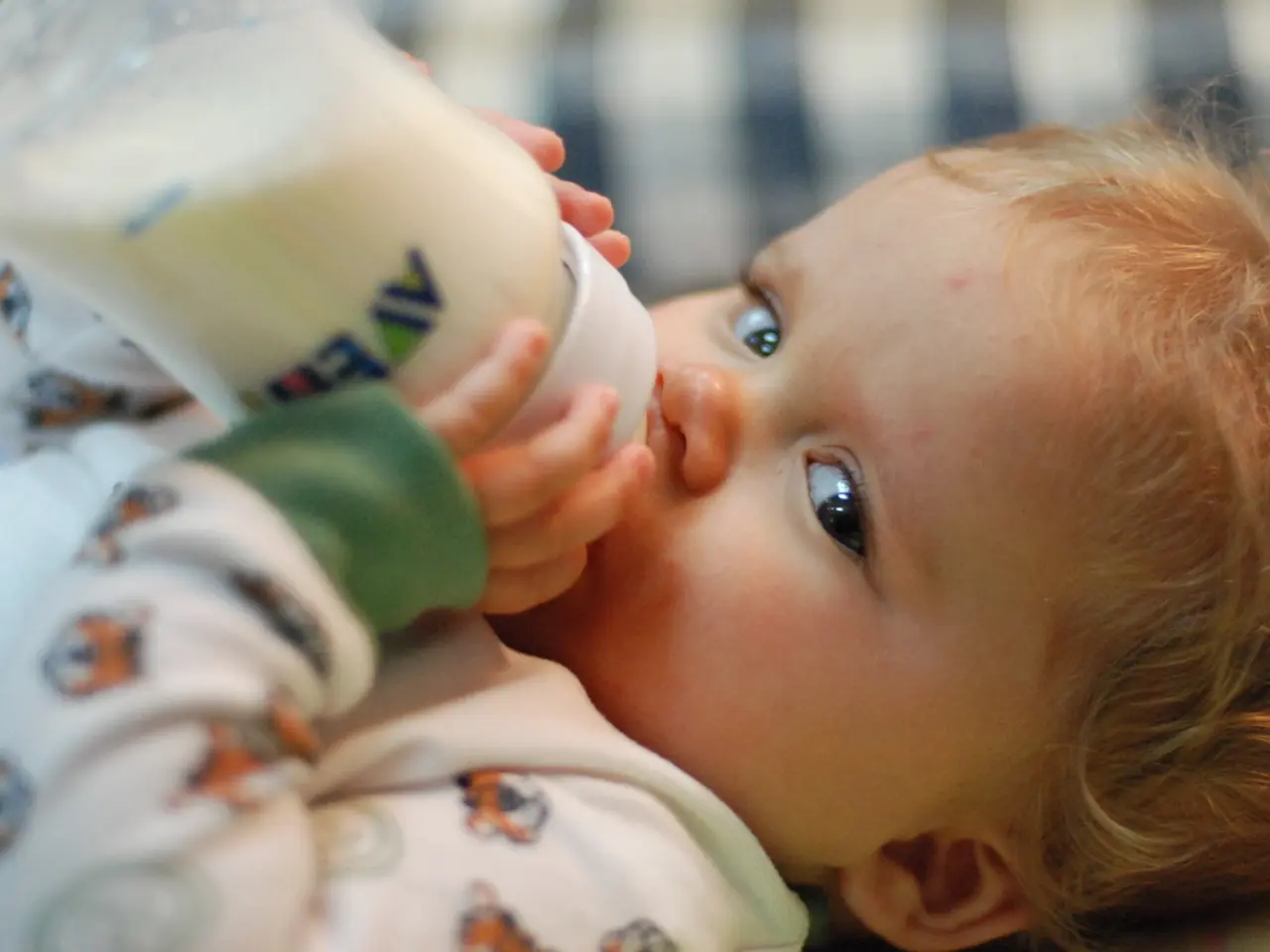 Lactose presence in breast milk and associated symptoms, along with management advice for lactose...