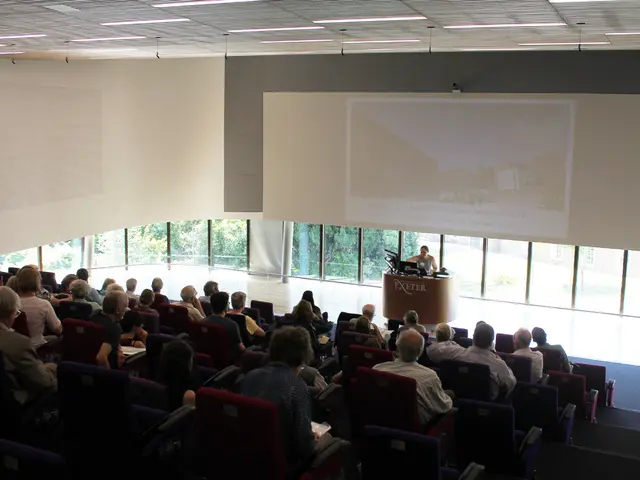 University students seize a lecture hall at Bielefeld University, employing video technology.