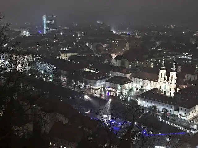 As we can see in the image there are buildings, lights, water, trees and sky. The image is little...